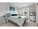 Bright bedroom with white walls, comfy bedding, and plenty of natural light at 1815 Kaufman Cir, Lady Lake, FL 32159