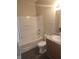 Bathroom with a tub-shower combo, vanity sink, and toilet at 222 Bacopa Pass, Davenport, FL 33897