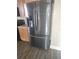 Modern stainless steel refrigerator in a well-lit kitchen at 222 Bacopa Pass, Davenport, FL 33897