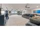 Large bonus room featuring comfortable seating, media, and music set up at 2330 Nuthatch St, St Cloud, FL 34771