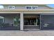 View of screened-in patio with outdoor dining and access to the home's interior at 2330 Nuthatch St, St Cloud, FL 34771