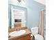 Bathroom featuring a shower-tub combo and a large sink at 2336 Martins Run, Tavares, FL 32778