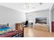Bedroom featuring natural lighting and hardwood floors at 2336 Martins Run, Tavares, FL 32778