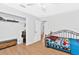 bedroom featuring a closet and hardwood flooring at 2336 Martins Run, Tavares, FL 32778