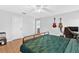 Bedroom featuring hardwood flooring and modern decor at 2336 Martins Run, Tavares, FL 32778