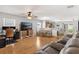 Open concept living room with a view of the kitchen and dining area at 2336 Martins Run, Tavares, FL 32778
