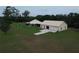 Country home with expansive lawn and a detached garage/workshop, perfect for hobbyists at 3147 Rambler Ave, St Cloud, FL 34772
