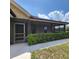 Charming exterior view of the home, showcasing the inviting porch and manicured hedges at 3147 Rambler Ave, St Cloud, FL 34772