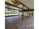 Large screened patio with brick pavers and ceiling fans offers a relaxing outdoor space at 3147 Rambler Ave, St Cloud, FL 34772