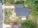 Aerial shot of the home showing roof, driveway, backyard, and adjacent structures at 326 N Lancelot Ave, Orlando, FL 32835