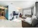 Inviting living room with tile flooring, modern furniture, and plenty of natural light at 326 N Lancelot Ave, Orlando, FL 32835