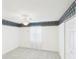 Bright bedroom featuring ceiling fan, neutral carpet, and bright window at 32701 Timberwood, Leesburg, FL 34748