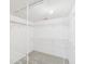 Bright walk-in closet featuring wire shelving for storage and organization at 32701 Timberwood, Leesburg, FL 34748