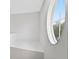 Bright landing featuring a unique round window at 33316 Irongate Dr, Leesburg, FL 34748