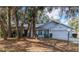 Charming single-story home with mature trees and a well-maintained lawn at 35219 Haines Creek Rd, Leesburg, FL 34788