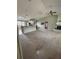 Open living area with high ceilings and great flow to kitchen with a breakfast bar for seating at 35219 Haines Creek Rd, Leesburg, FL 34788