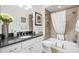 Bathroom featuring granite counters, ample vanity storage, and a shower-tub combination at 3566 Gentle Ter, The Villages, FL 32163
