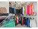 Walk-in closet with ample storage for clothing and accessories at 3566 Gentle Ter, The Villages, FL 32163