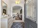 Open foyer featuring neutral decor, elegant furnishings, and a view into the bright living spaces at 3566 Gentle Ter, The Villages, FL 32163