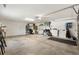 Spacious and well-organized garage with storage solutions and ample room for vehicles and equipment at 3566 Gentle Ter, The Villages, FL 32163