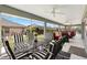 Outdoor lanai with exterior views, providing a versatile living space for relaxation and entertaining at 3566 Gentle Ter, The Villages, FL 32163