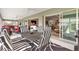 Spacious lanai with exterior views, seamlessly connecting indoor and outdoor living spaces at 3566 Gentle Ter, The Villages, FL 32163