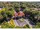 Aerial view of Kings Ridge community entrance with decorative gate and lush landscaping at 3586 Eversholt St, Clermont, FL 34711