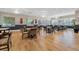 Bright dining area with multiple tables and chairs, perfect for community gatherings and events at 3586 Eversholt St, Clermont, FL 34711