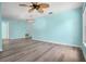 Inviting living room featuring sleek floors, modern lighting, and an open layout for easy entertainment at 3586 Eversholt St, Clermont, FL 34711