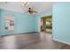 Spacious living room with modern flooring and sliding glass doors for ample natural light and indoor-outdoor flow at 3586 Eversholt St, Clermont, FL 34711