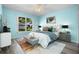 Serene main bedroom featuring a comfortable bed, stylish decor, and plenty of natural light at 3586 Eversholt St, Clermont, FL 34711