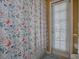 Bathroom featuring a nautical-themed shower curtain and a door with blinds at 359 Blue Branch St, Eustis, FL 32736