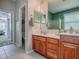 Bathroom offering double sinks, modern fixtures, and plenty of cabinet space at 359 Blue Branch St, Eustis, FL 32736