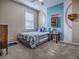 Inviting bedroom featuring custom baseball decor and a cozy atmosphere at 359 Blue Branch St, Eustis, FL 32736