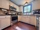 Bright and airy kitchen with stainless steel appliances and ample counter space for cooking at 3664 Se 45Th Pl, Ocala, FL 34480