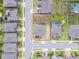 Aerial view of a home showcasing the lot's shape and position within a residential area at 391 Cheeota Ct, Minneola, FL 34715