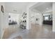 Open-concept entryway showcases tile flooring and seamless flow to adjacent living spaces at 391 Cheeota Ct, Minneola, FL 34715