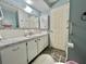Bathroom featuring vanity, marble countertop and toilet at 424 Hawthorne Blvd, Leesburg, FL 34748