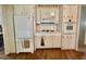 White kitchen featuring appliances and ample storage at 424 Hawthorne Blvd, Leesburg, FL 34748