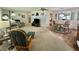 Open living area flows seamlessly into the dining room, creating a welcoming and connected space at 424 Hawthorne Blvd, Leesburg, FL 34748
