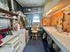 Organized shed interior featuring shelving, workbench, pegboard and storage at 424 Hawthorne Blvd, Leesburg, FL 34748
