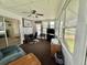 Bright sun room featuring several large windows and neutral colors at 424 Hawthorne Blvd, Leesburg, FL 34748