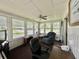 View of the cozy sun room with natural light and a ceiling fan at 424 Hawthorne Blvd, Leesburg, FL 34748