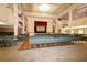 Spacious auditorium with a stage and rows of comfortable seating, ideal for community events at 5008 Sawgrass Lake Cir, Leesburg, FL 34748