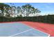 Well-maintained outdoor basketball court, perfect for a friendly game or practice at 5008 Sawgrass Lake Cir, Leesburg, FL 34748