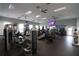 Well-equipped fitness center featuring modern exercise machines, ceiling fans, and an exit sign at 5008 Sawgrass Lake Cir, Leesburg, FL 34748