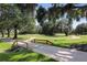 Picturesque golf course with winding paths and lush greenery at 5008 Sawgrass Lake Cir, Leesburg, FL 34748