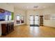 Lobby with information center, glass doors, and tile flooring at 5008 Sawgrass Lake Cir, Leesburg, FL 34748