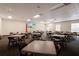 Meeting room with tables, chairs, a television, and an American flag at 5008 Sawgrass Lake Cir, Leesburg, FL 34748