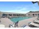 Relaxing community pool featuring lounge chairs for soaking up the sun at 5008 Sawgrass Lake Cir, Leesburg, FL 34748